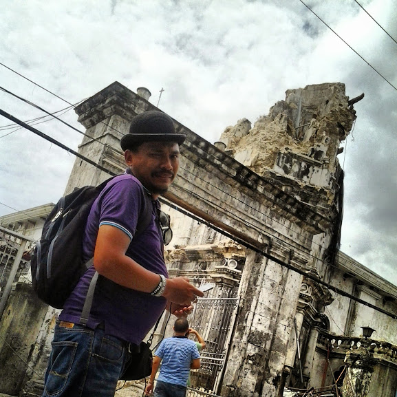 The church belfry as seen from the street with Ka Bino