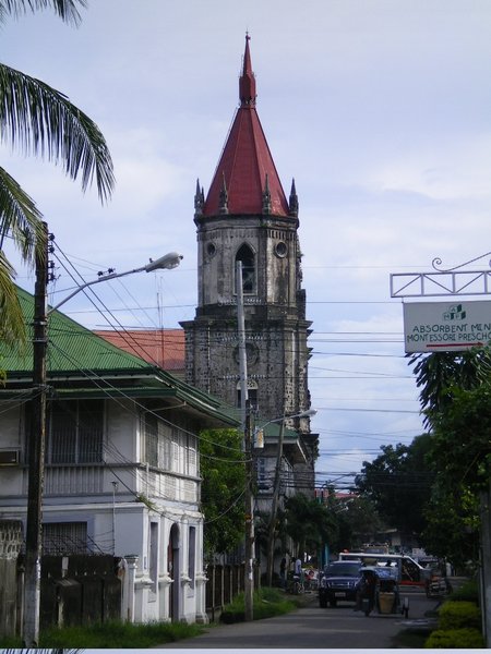 Locsin House on Lower Bottom Portion of Photo with Molo Church
