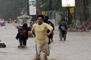 Storm Fengshen (Frank) ravages Iloilo / Photo by Ricky Alejo | AFP